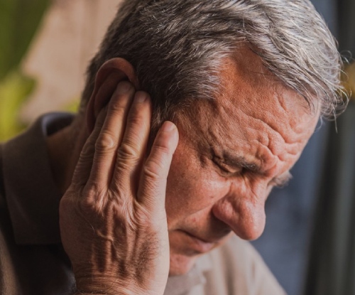 Man having ear pain